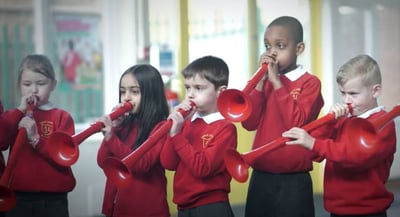 Children playing pBuzz in a classroom