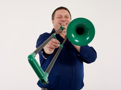 Chris Fower with green pBone - the greenest plastic instrument on the planet