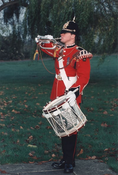 Soldier with a drum and bugle.